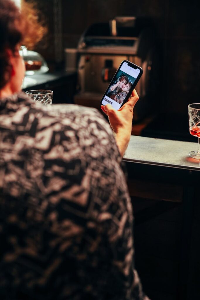 A Couple Looking at Their Photos on a Smartphone