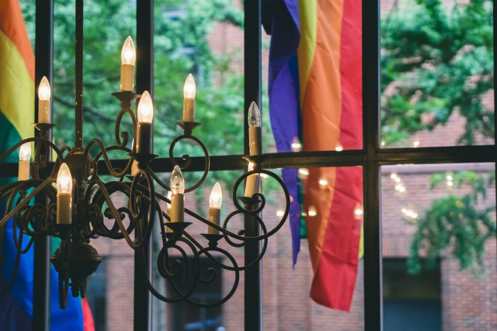 black metal chandelier turned-on